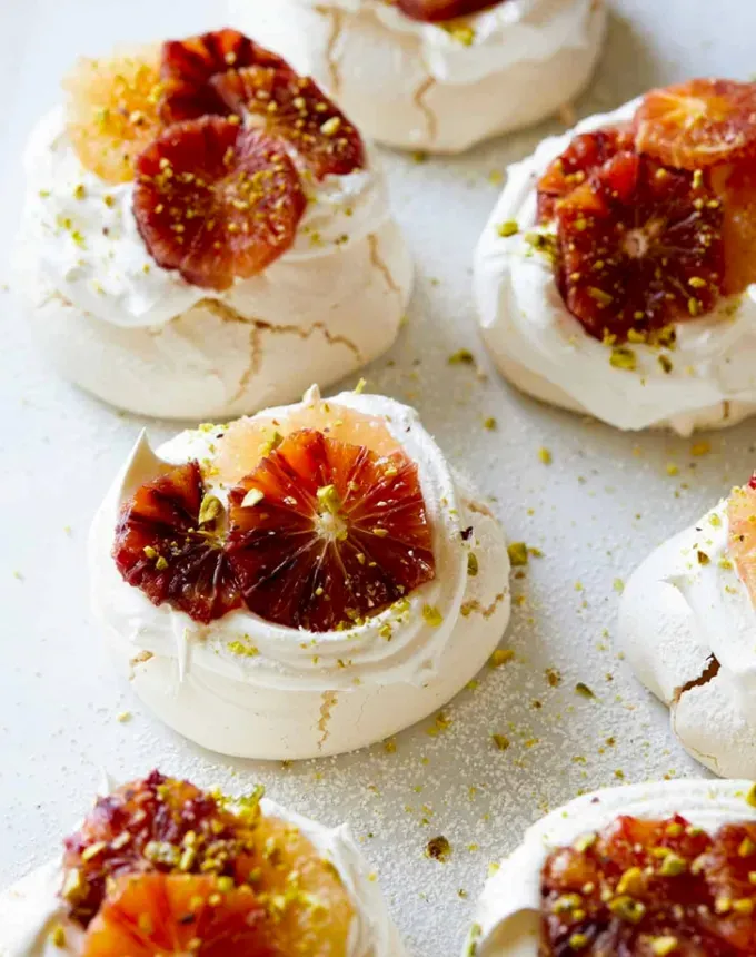 mini christmas desserts: mini citrus pavlovas' title='31 Mini Christmas Desserts That Are Equal Parts Delightful and Delicious