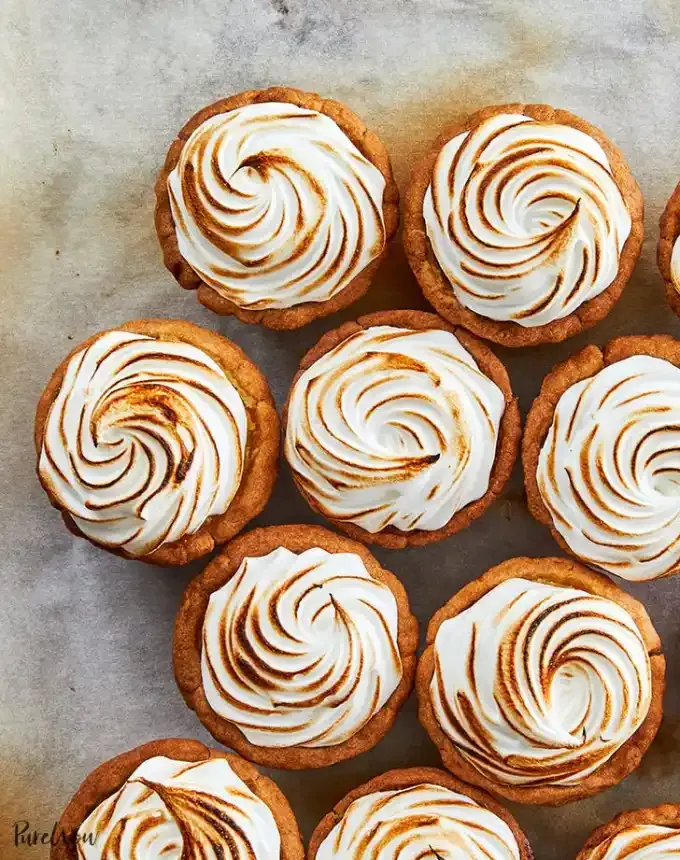mini christmas desserts: muffin tin lemon meringue tartlets' title='31 Mini Christmas Desserts That Are Equal Parts Delightful and Delicious