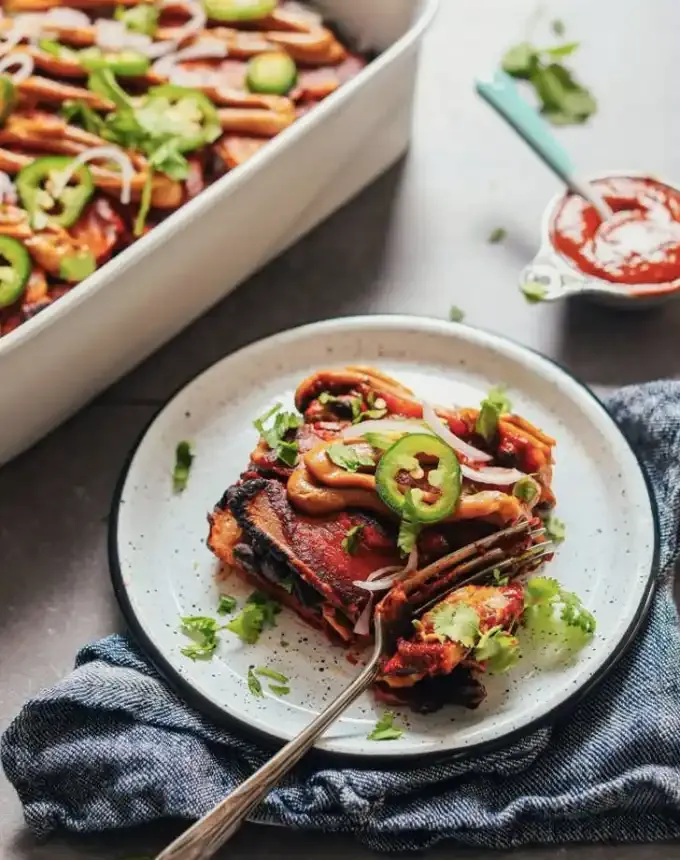 clean eating dinner recipes: black bean plantain enchiladas' title='65 Clean-Eating Dinner Recipes for the New Year and Beyond