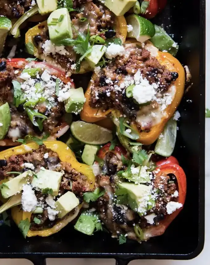 clean eating dinner recipes: turkey and quinoa stuffed peppers' title='65 Clean-Eating Dinner Recipes for the New Year and Beyond