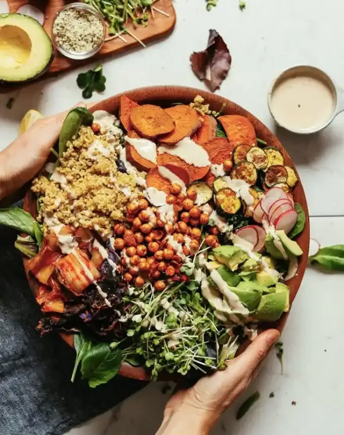 clean eating dinner recipes: kale salad with savory tahini dressing' title='65 Clean-Eating Dinner Recipes for the New Year and Beyond