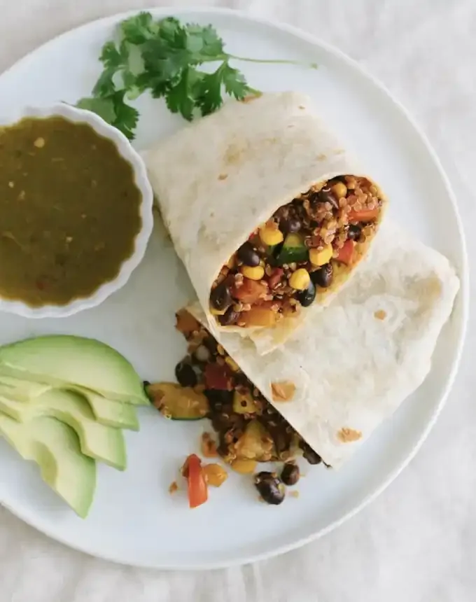 clean eating dinner recipes: spicy black bean and quinoa vegan burritos' title='65 Clean-Eating Dinner Recipes for the New Year and Beyond