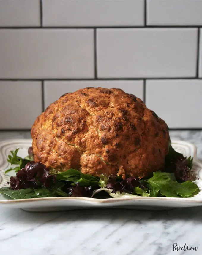 clean eating dinner recipes: spicy whole roasted cauliflower' title='65 Clean-Eating Dinner Recipes for the New Year and Beyond