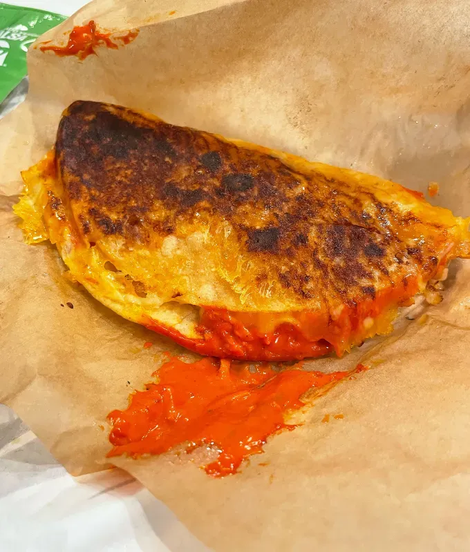 new taco bell menu items review caliente cantina chicken crispy taco' title='A Food Editor’s Ranking (and Photos) of Taco Bell’s 10 Newest Menu Items Including Toasted Cheddar Street Chalupas