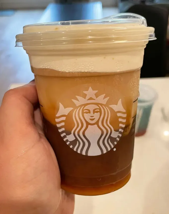best starbucks drinks: macadamia nut cold foam latte' title='I’m a Former Starbucks Barista and These Are the 30 Best Starbucks Drinks of All Time