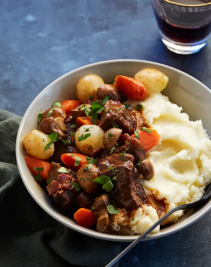 what to serve with polenta: cheater’s slow cooker beef bourguignon' title='Wondering What to Serve with Polenta? Here Are 27 Ideas from Hearty to Healthy