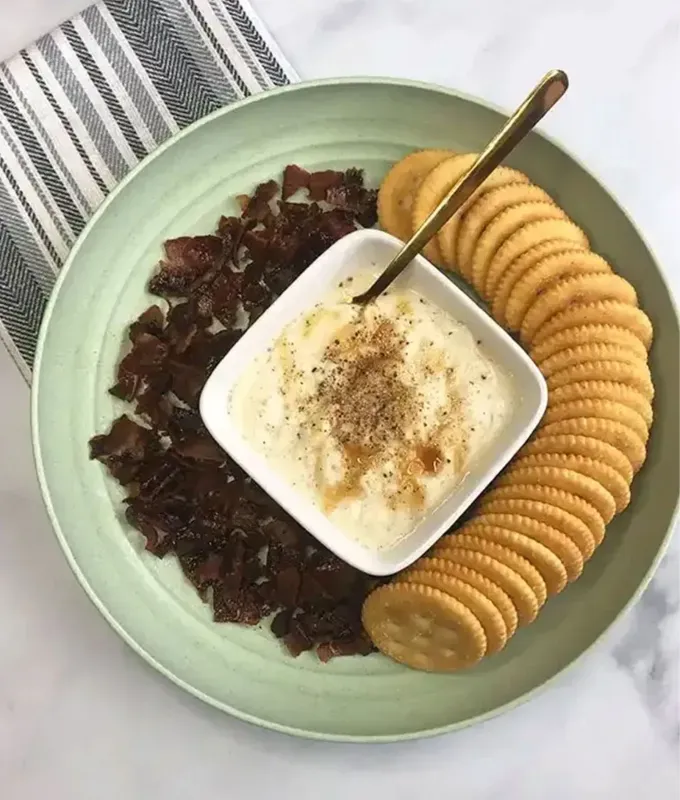bite-sized-appetizers: Ritz Crackers with Whipped Honey Ricotta and Bacon.' title='45 Bite-Sized Appetizers That Are as Cute as They Are Delicious