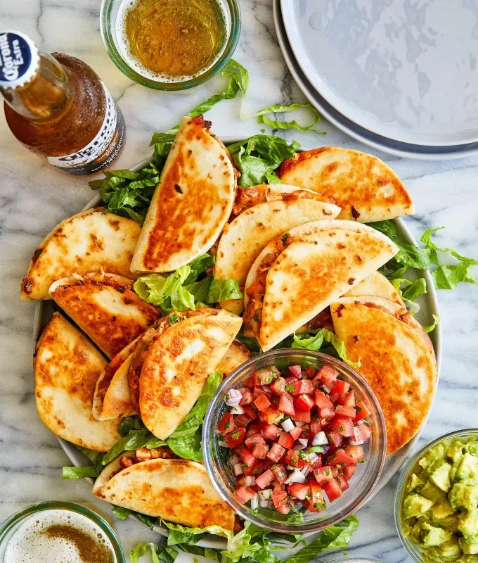 bite-sized-appetizers: Mini Chicken Quesadillas.' title='45 Bite-Sized Appetizers That Are as Cute as They Are Delicious