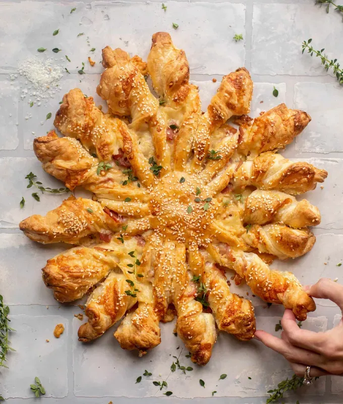 bite-sized-appetizers: Ham and Swiss Puff Pastry Twists.' title='45 Bite-Sized Appetizers That Are as Cute as They Are Delicious