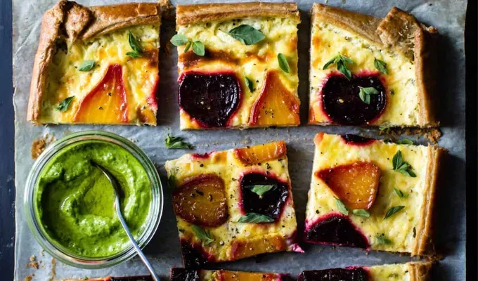 bite-sized-appetizers: Ricotta and Roasted Beet Tart with Beet Greens Pesto.' title='45 Bite-Sized Appetizers That Are as Cute as They Are Delicious