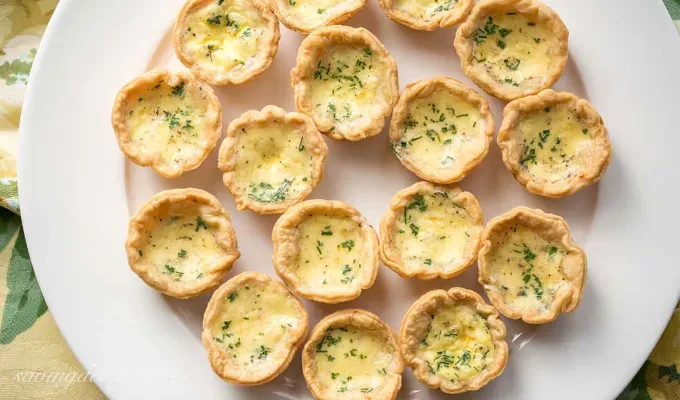 bite-sized-appetizers: Mini Cheese Quiche.' title='45 Bite-Sized Appetizers That Are as Cute as They Are Delicious