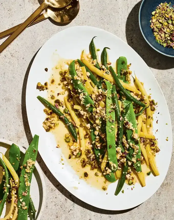picnic food ideas: green beans with garlicky pistachio vinaigrette' title='68 Picnic Food Ideas to Pack in Your Basket