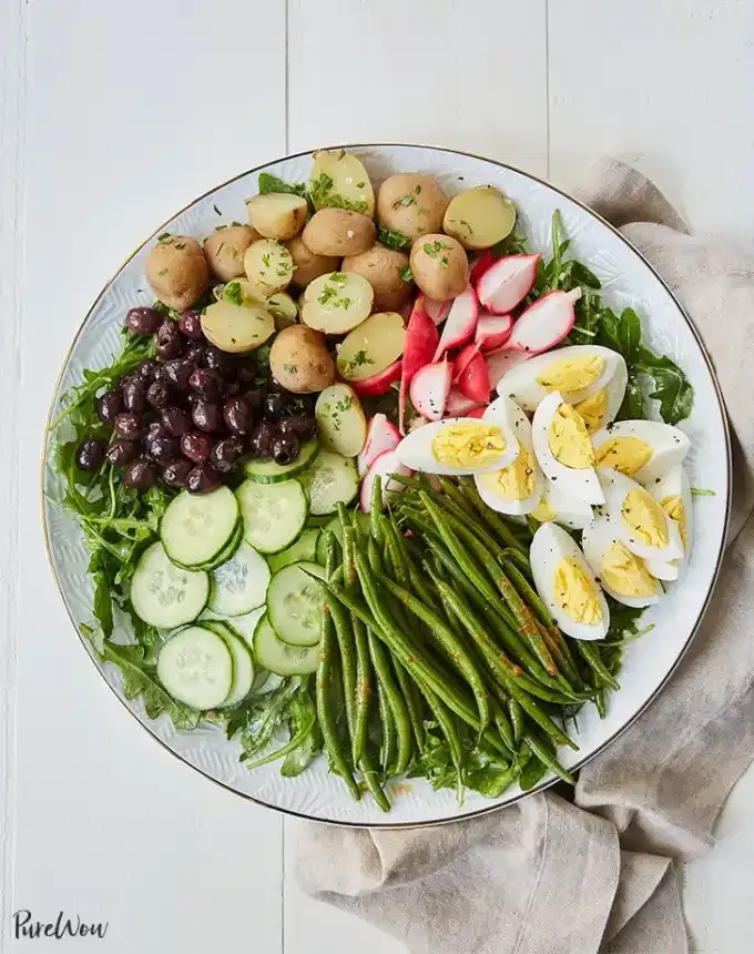 picnic food ideas: veggie nicoise salad with red curry green beans' title='68 Picnic Food Ideas to Pack in Your Basket