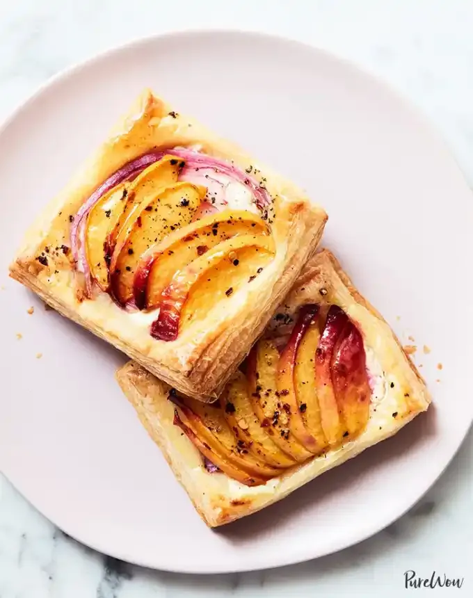 picnic food ideas: mini peach tarts with goat cheese and honey' title='68 Picnic Food Ideas to Pack in Your Basket
