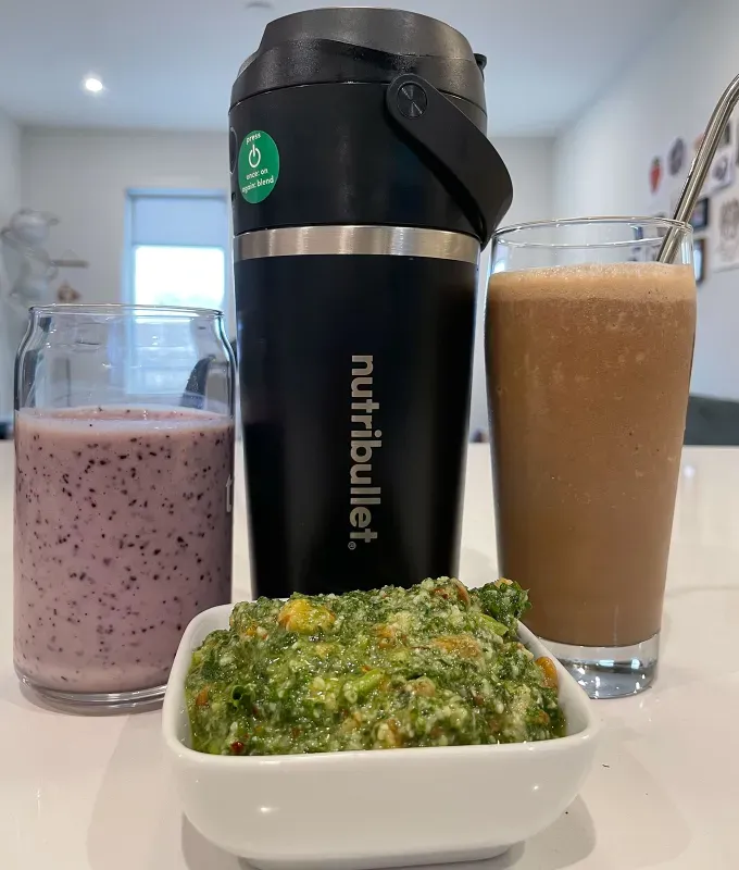 nutribullet flip blender review: nutribullet flip with two smoothies and pesto' title='A Food Editor’s Honest Review of the Nutribullet Flip a New Portable Blender