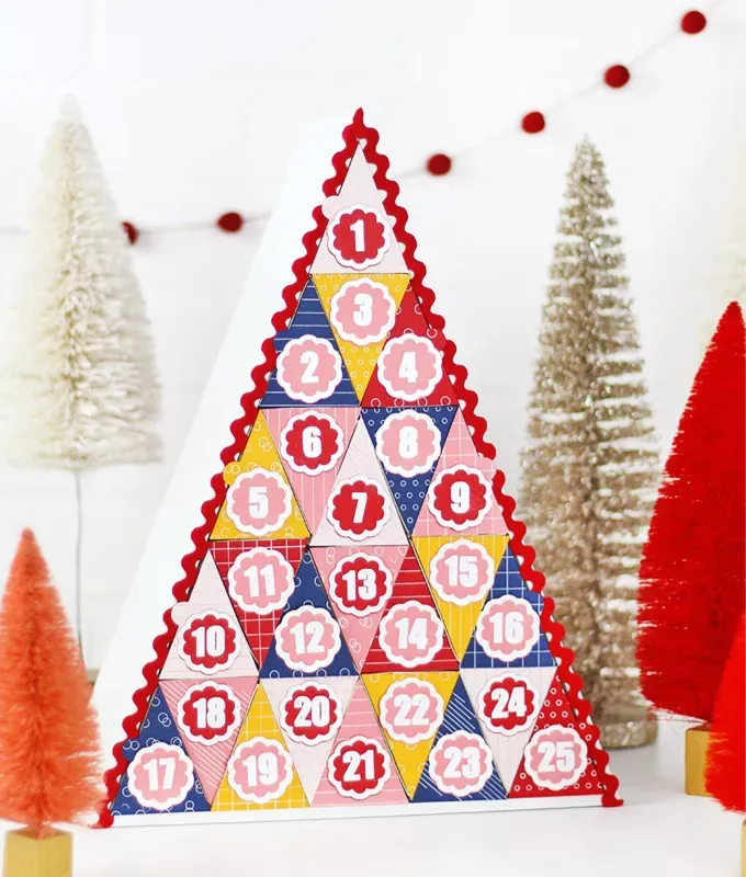 a triangular advent calendar' title='60 Festive Christmas Crafts for Adults