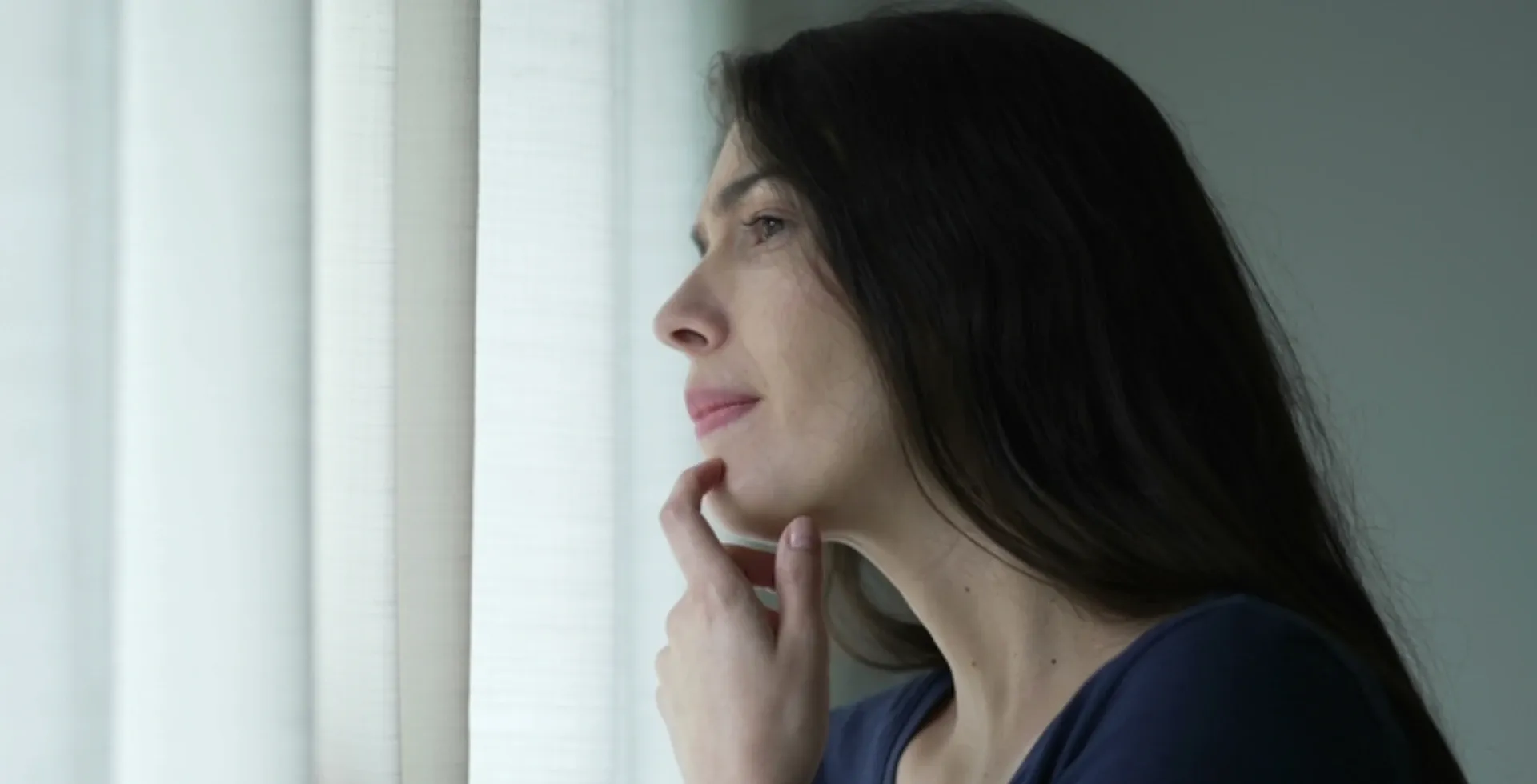 sad woman looking out the window' title='signs your body is rejecting your partner according to psychology make excuses to avoid spending time together' typeof='foaf:Image' decoding='async