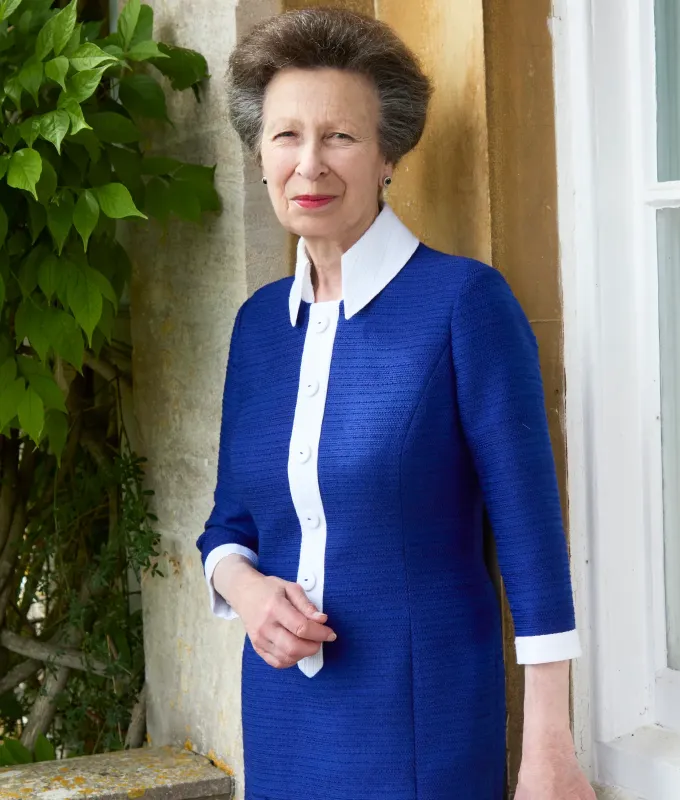 princess-anne-childhood-photos-blue-dress' fetchpriority='auto' title='Buckingham Palace Just Posted Childhood Photos of Princess Anne—and Look at Those Blonde Curls
