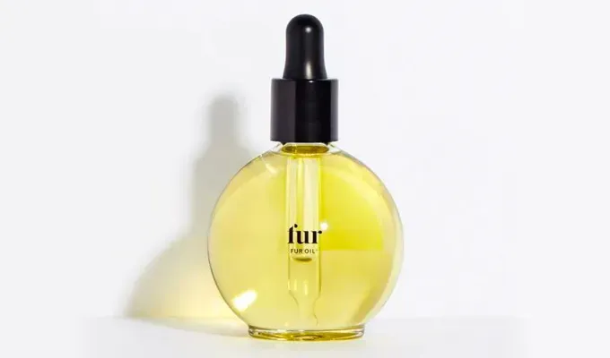 Honest and Candid Review of Fur Oil: product shot of fur oil against a grey background' title='I Used this Ingrown Bikini Bump Eraser All Over My Body. Here’s What Happened