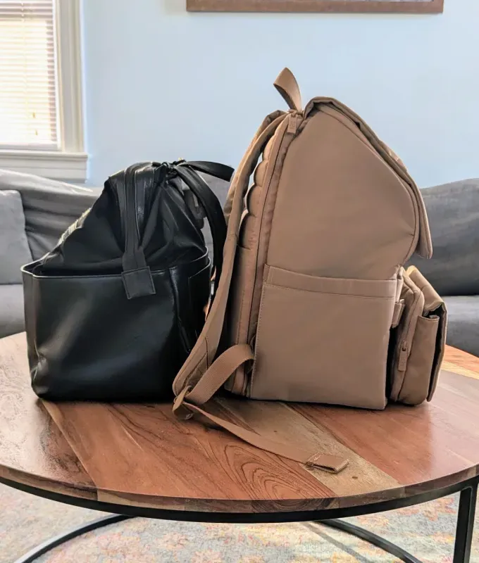 beis diaper backpack next to ultimate diaper backpack' title='If You’re Flying with a Baby This Year You Need to Read This Béis Ultimate Diaper Backpack Review