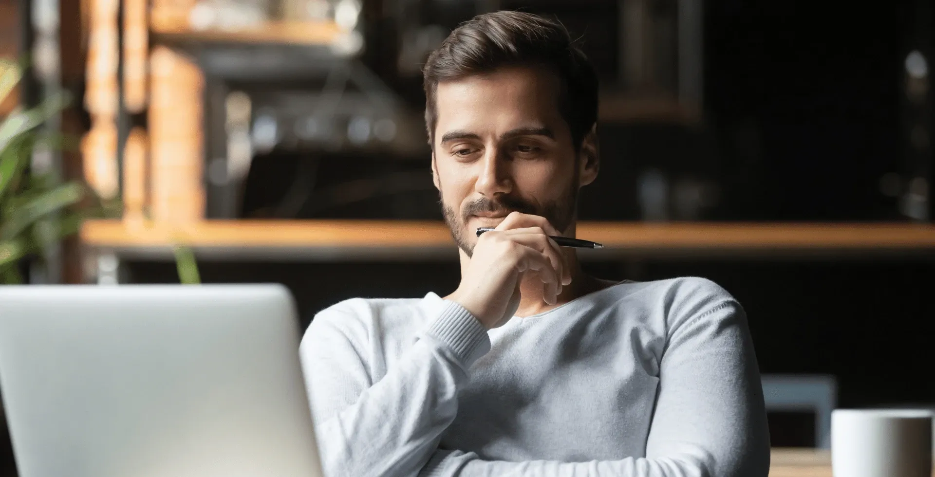 man working on laptop' title='Signs Of A Genuinely Lazy Person According To Psychology' typeof='foaf:Image' decoding='async