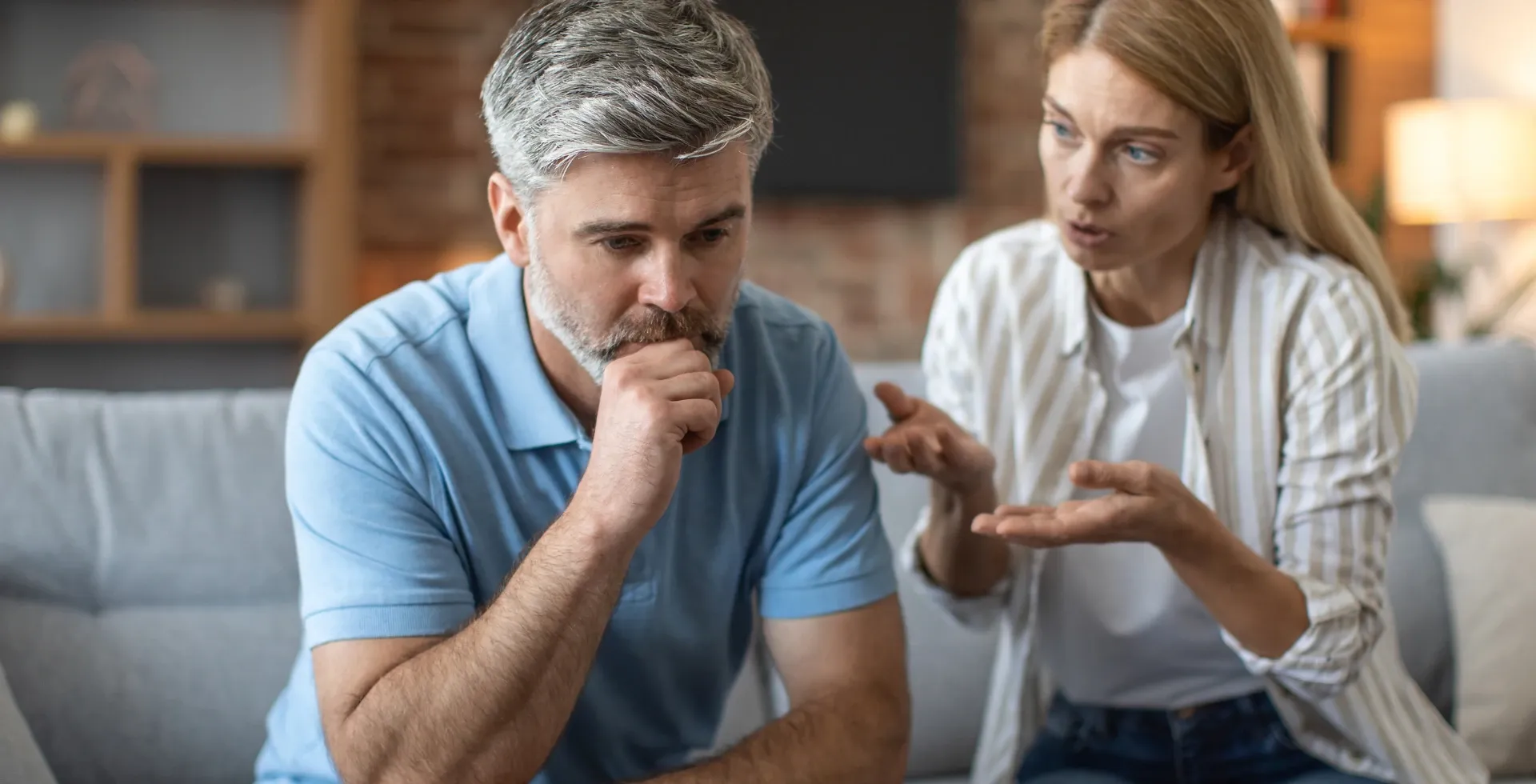 Older couple looking upset arguing on the couch.' title='Phrases Ungrateful People Say Often According To Psychology' typeof='foaf:Image' decoding='async