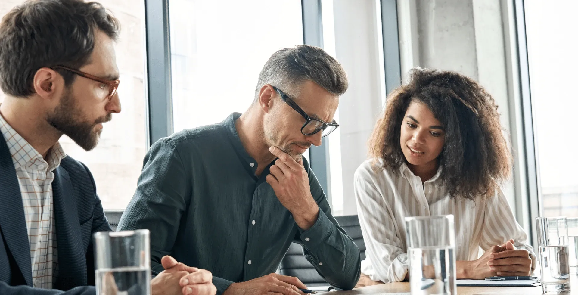 workers in a meeting' title='Subtle Traits Of People Who Have A Low IQ' typeof='foaf:Image' decoding='async