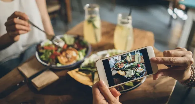 soft launching a relationship dinner' fetchpriority='auto' title='What Does It Mean to Soft Launch Your Relationship According to a Dating Expert (& What If Your Partner Isn’t on Board)?