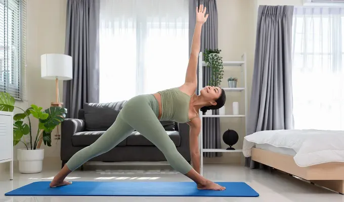 standing-yoga-poses-revolved-triangle-pose' fetchpriority='auto' title='30 Standing Yoga Poses Every Yogi Needs to Know