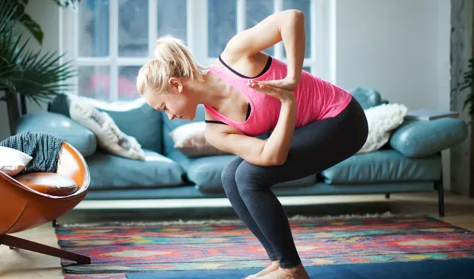 standing-yoga-poses-twisted-chair-pose' fetchpriority='auto' title='30 Standing Yoga Poses Every Yogi Needs to Know