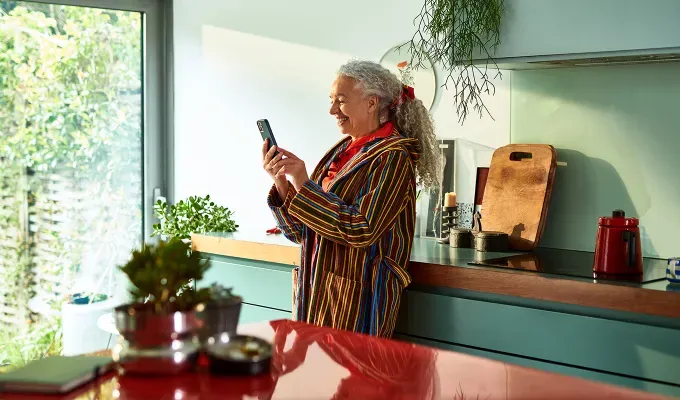 indoor-activities-for-kids-woman-talking-to-friends-on-phone' fetchpriority='auto' title='64 Indoor Activities for Adults That Are Perfect for Those Rainy Days